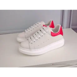 Hypeyourbeast Alexander McQueen White / Pink Lace Up Sneaker A. Mcqueen